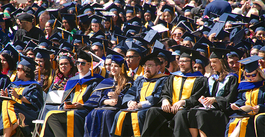 CIS Ph.D. students in the front row of the commencement ceremony.